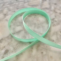 Buy some  3/8” Lucite Ribbon, by the foot at House of Greco